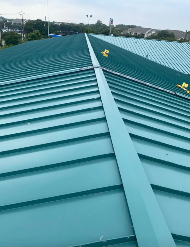 Green commercial metal roof ridge and valley for Metal Roof Repair in Hillcrest