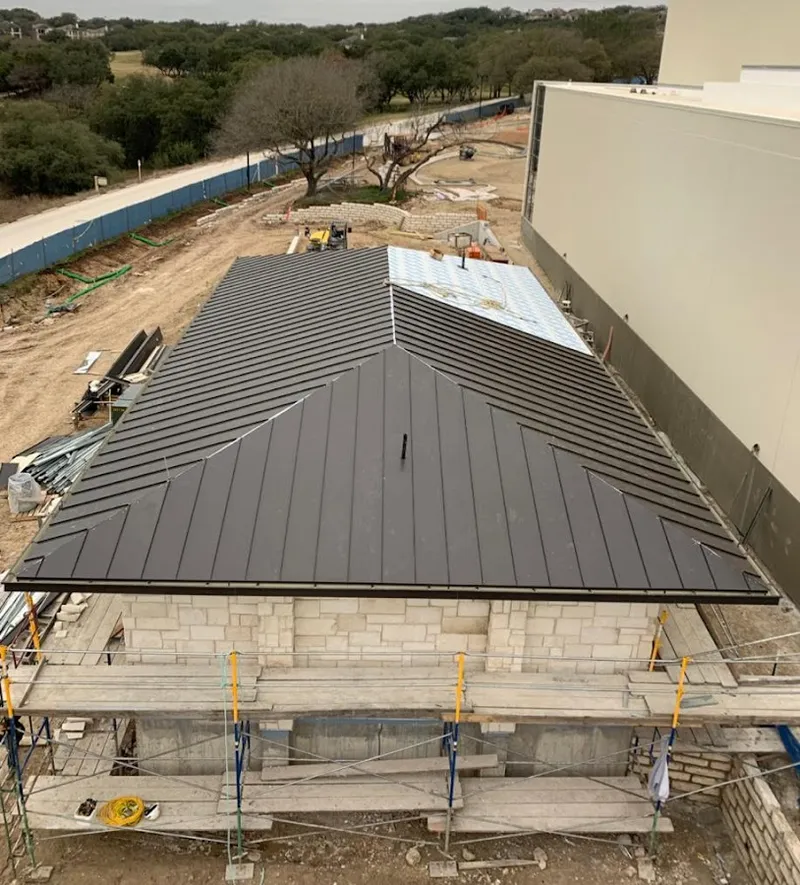 Metal roof new construction with scaffolding in Hillcrest