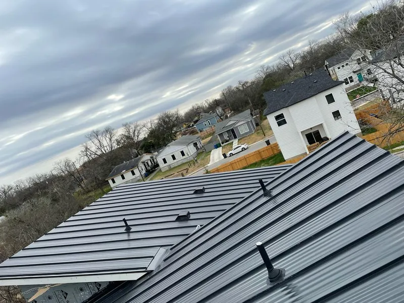 Standing seam metal roof panels with vents for Skylight Repair in Hillcrest